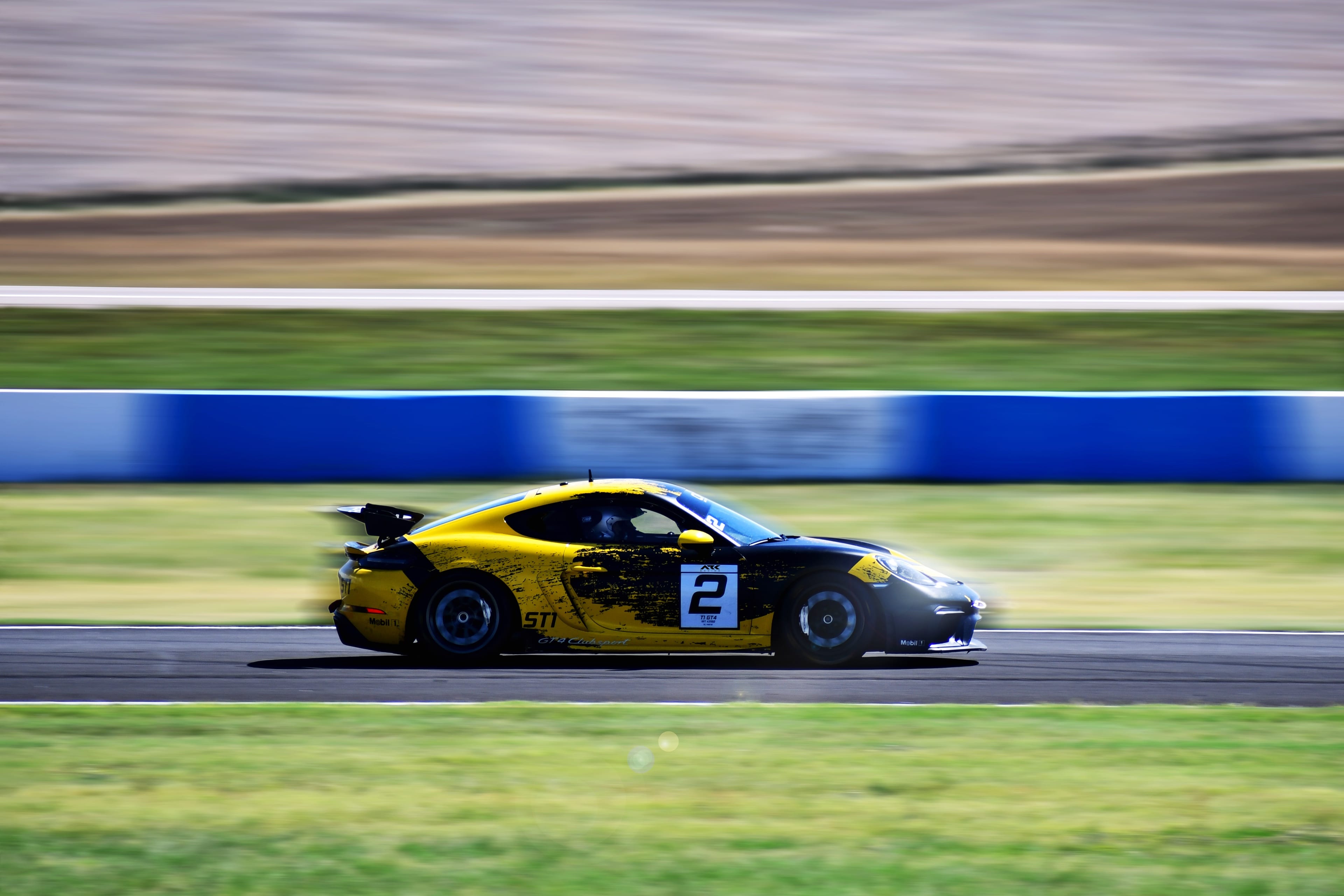 ARK Race Team Porsche Cayman GT4 Clubsport at speed
